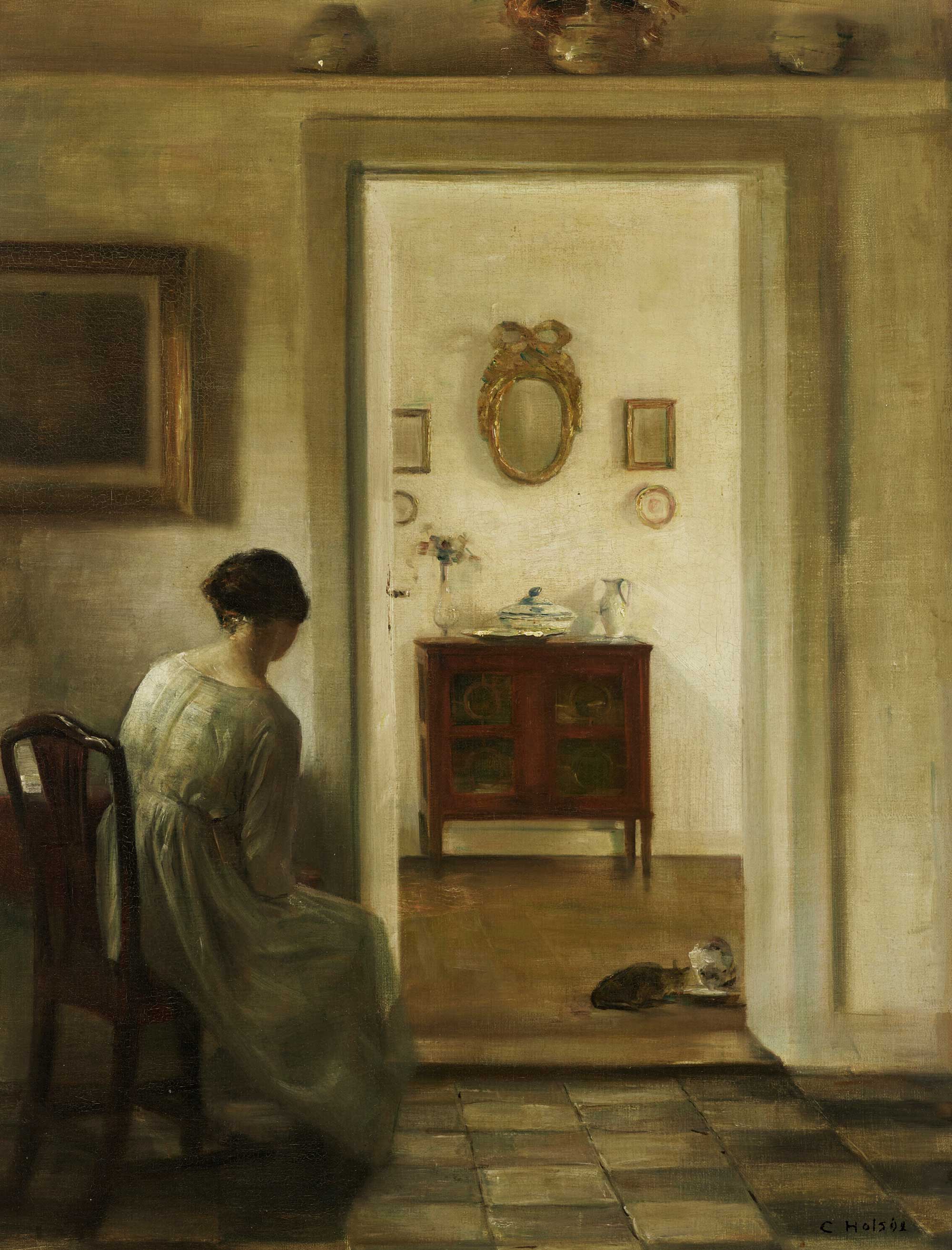 A Woman and Two Cats in an Intimate Interior Scene