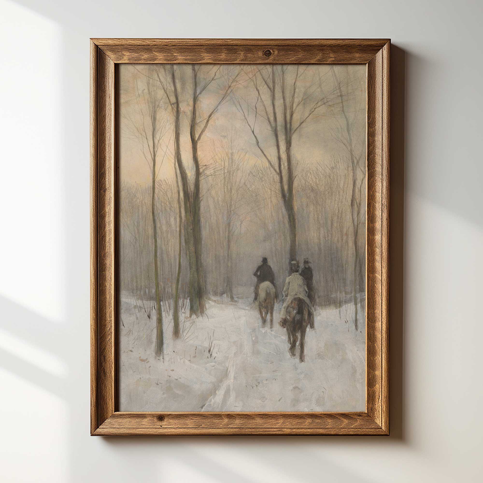 Framed painting of a snowy landscape with people on horseback.