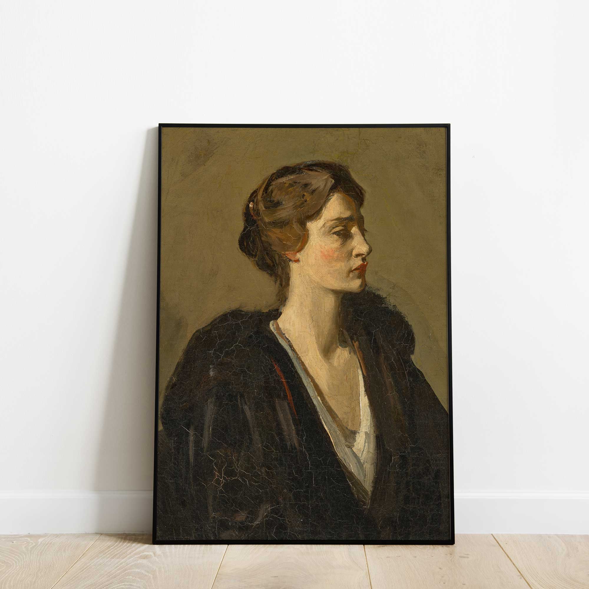 Framed portrait painting of a woman on a white wall