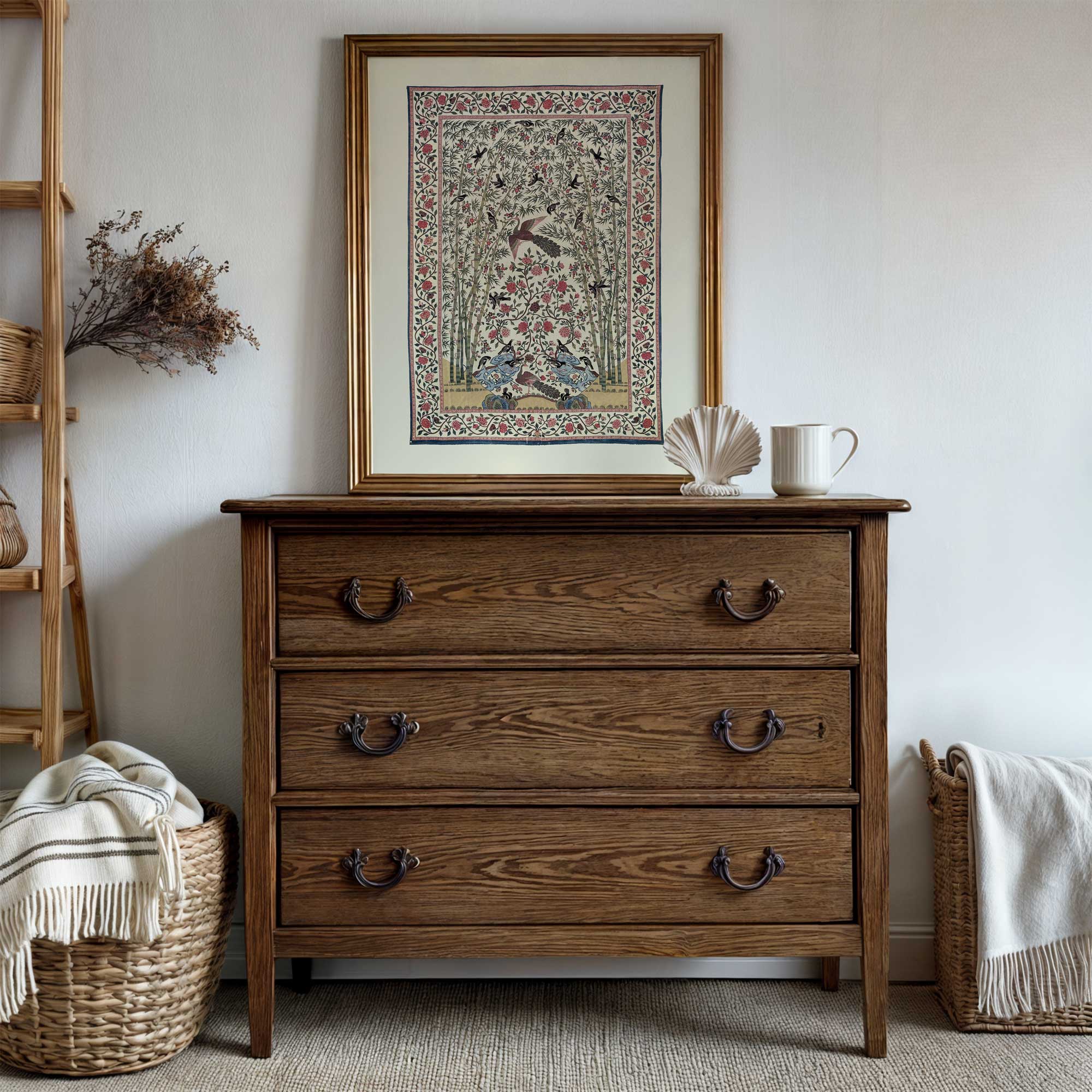 Handcrafted botanical textile print in ornate gold frame styled on wooden dresser.