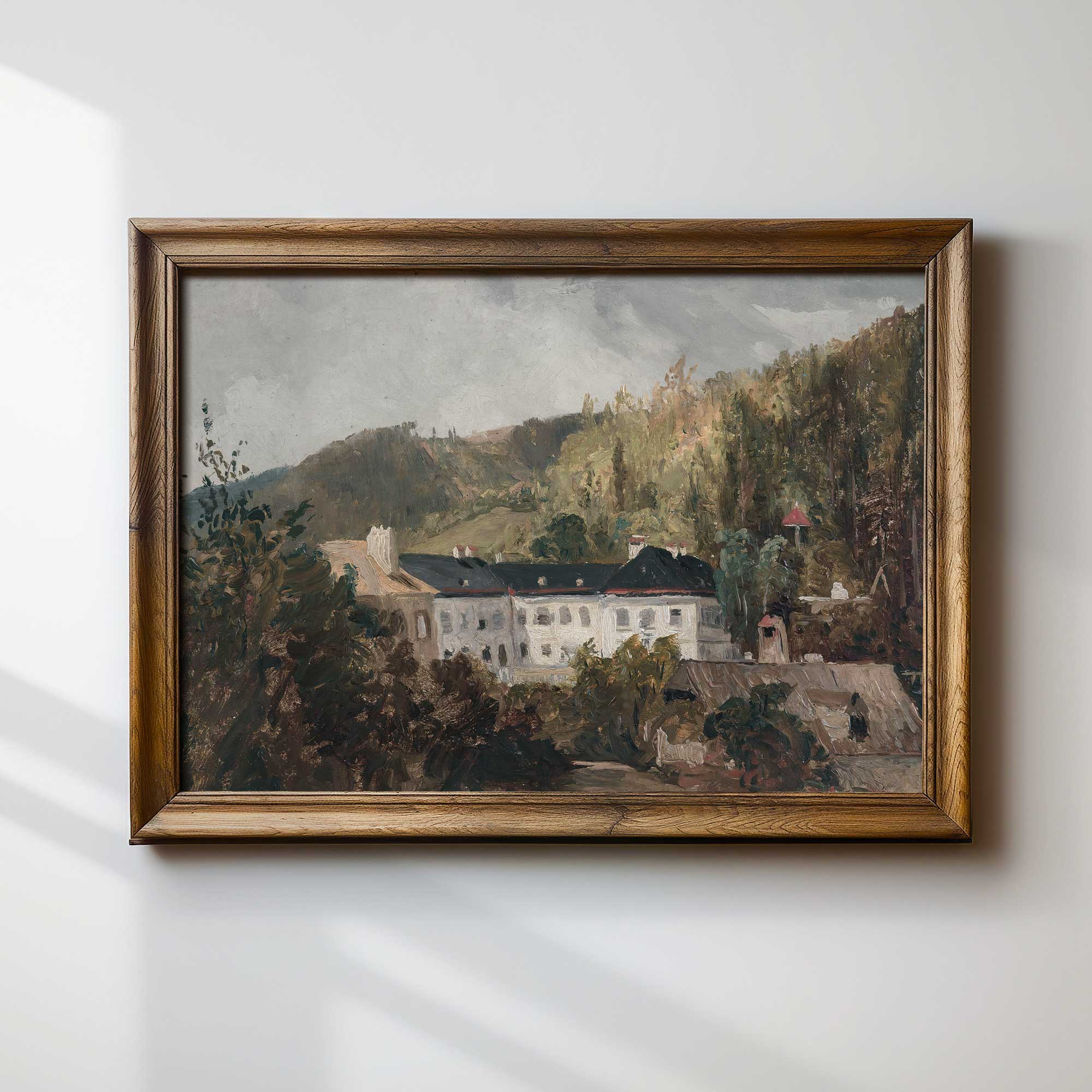 Framed painting of a European Manor in Woodland