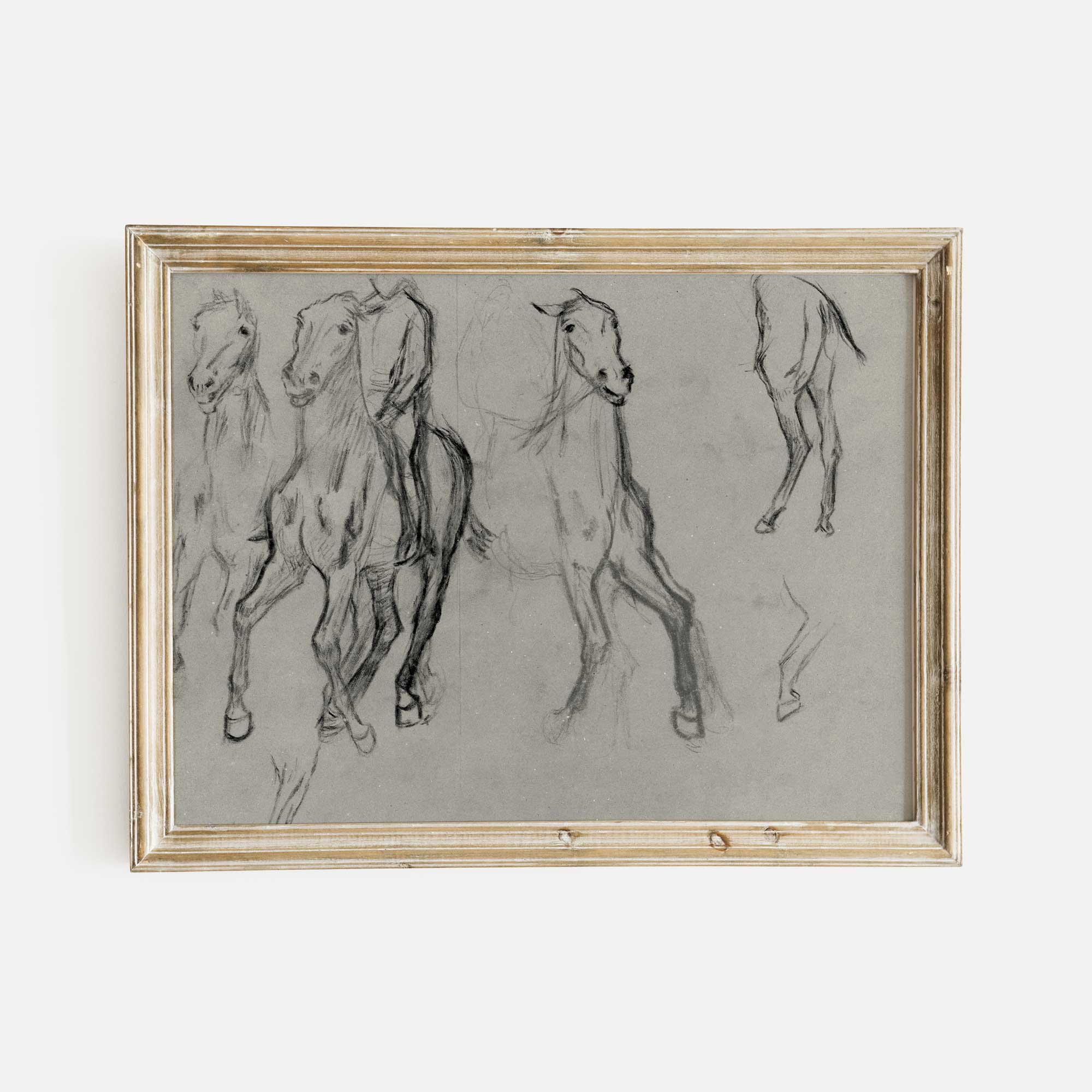 Framed drawing of horses on a light gray background