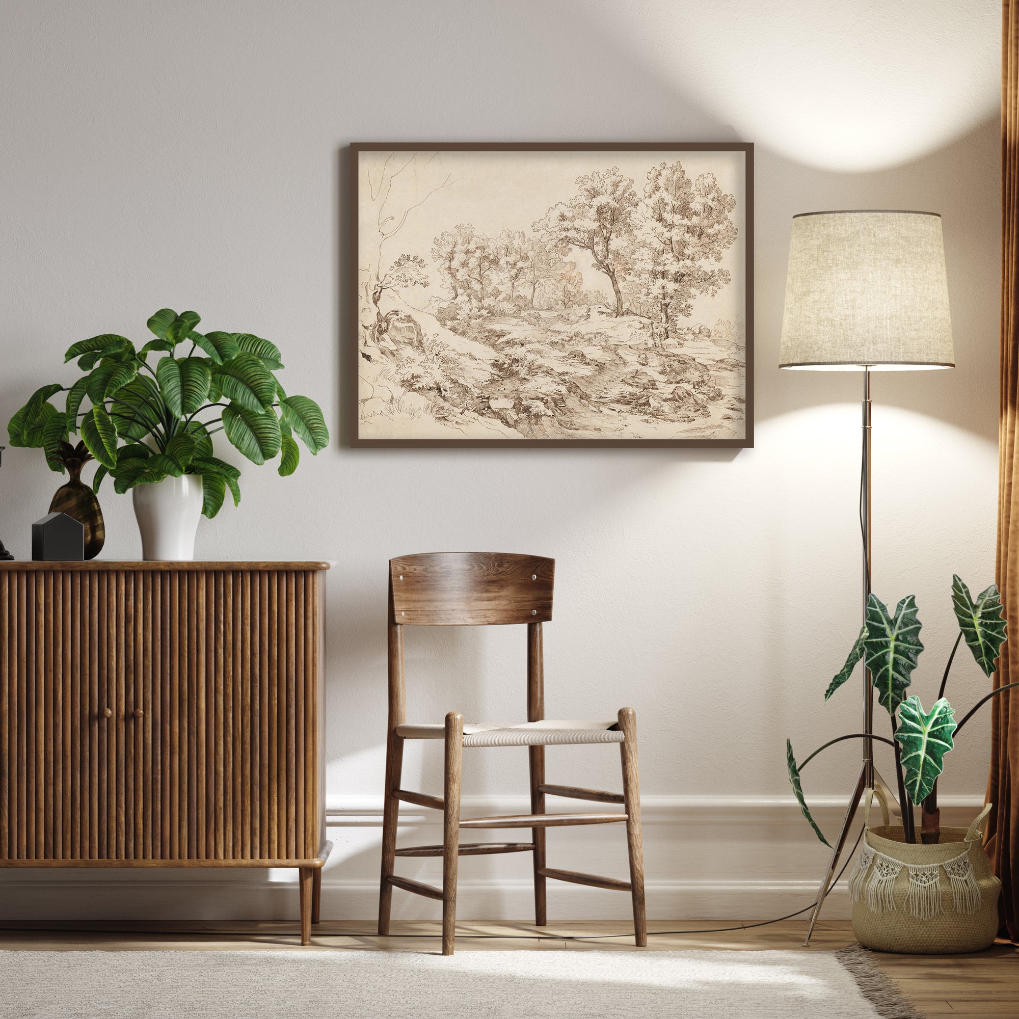 landscape drawing print on the Living room wall with wooden cabinet, chair, and floor lamp.
