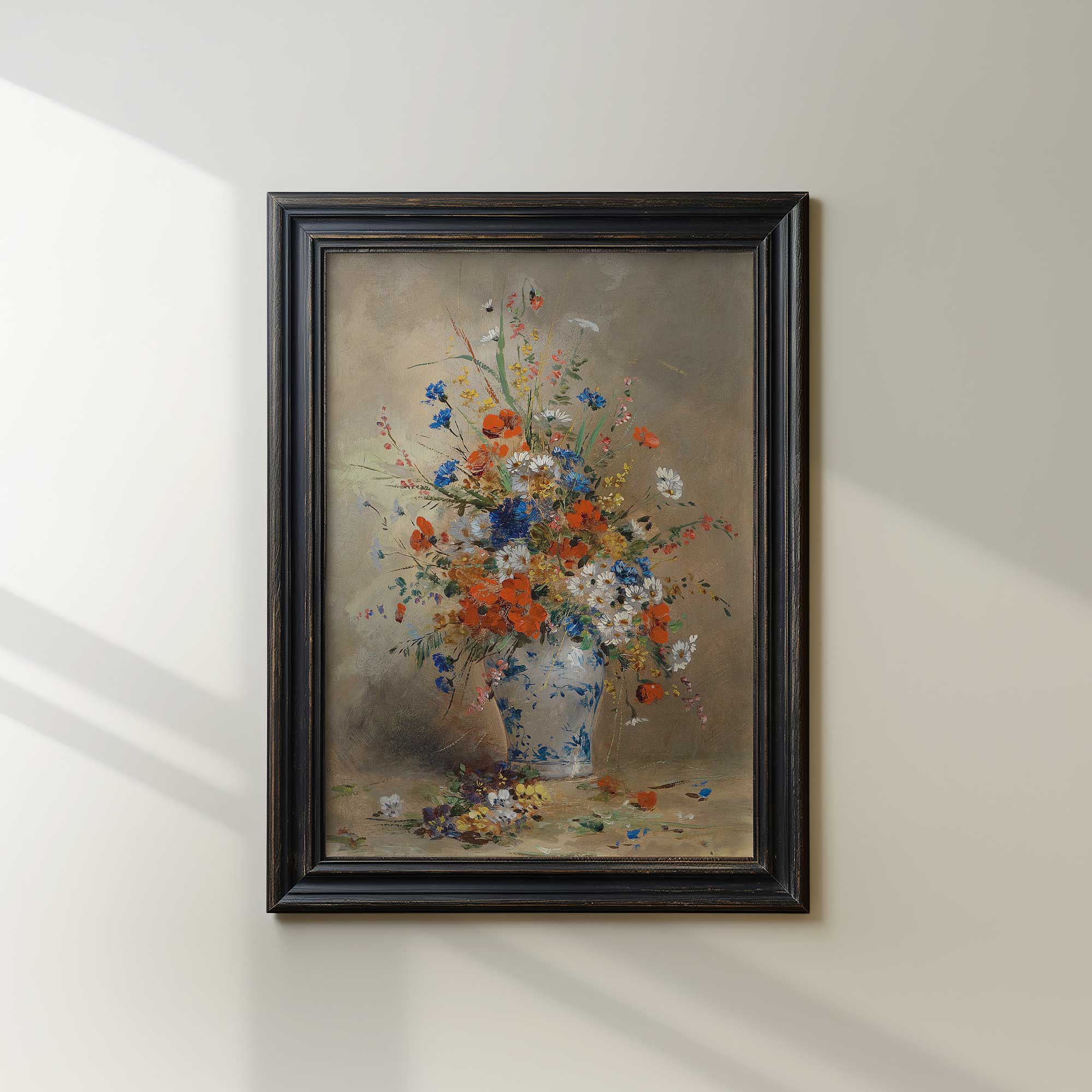 Framed painting of a floral arrangement on a wall