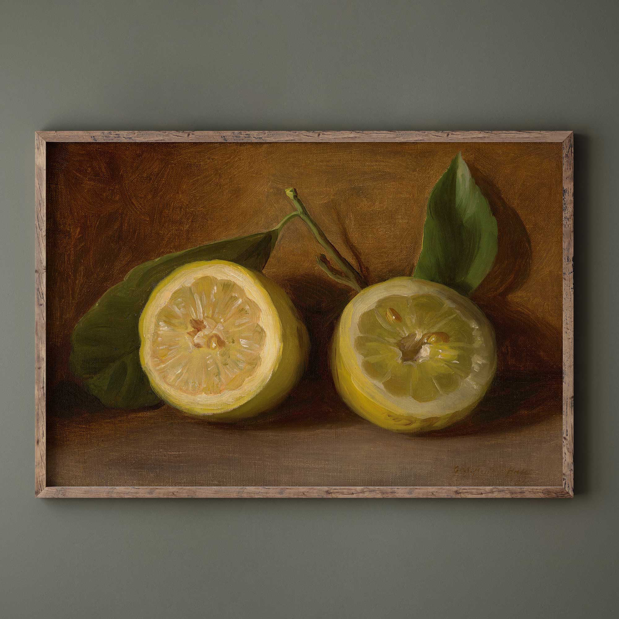Framed painting of two lemons with green leaves on a brown background
