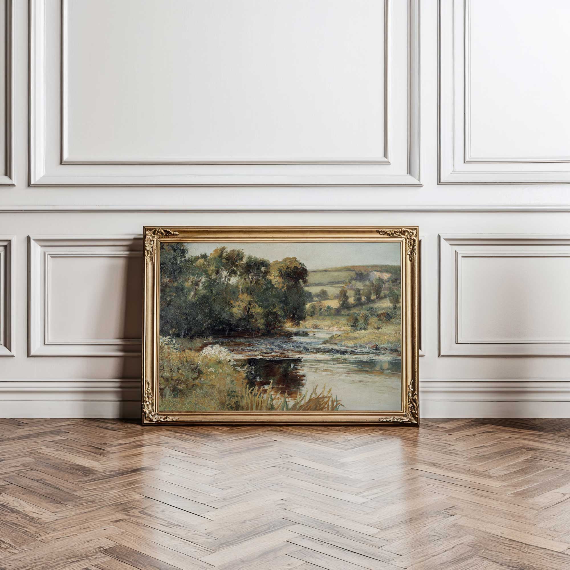 Vintage summer landscape print in an ornate gold frame with rustic country charm.