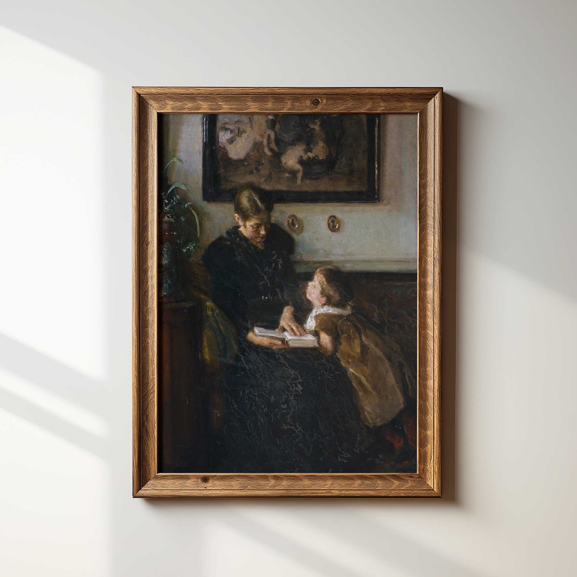 Vintage mother and child reading print in rustic wooden frame featuring antique farmhouse interior scene