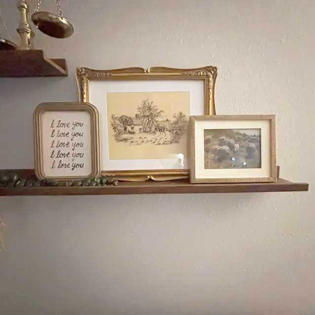 Vintage Prints Displayed on a Shelf