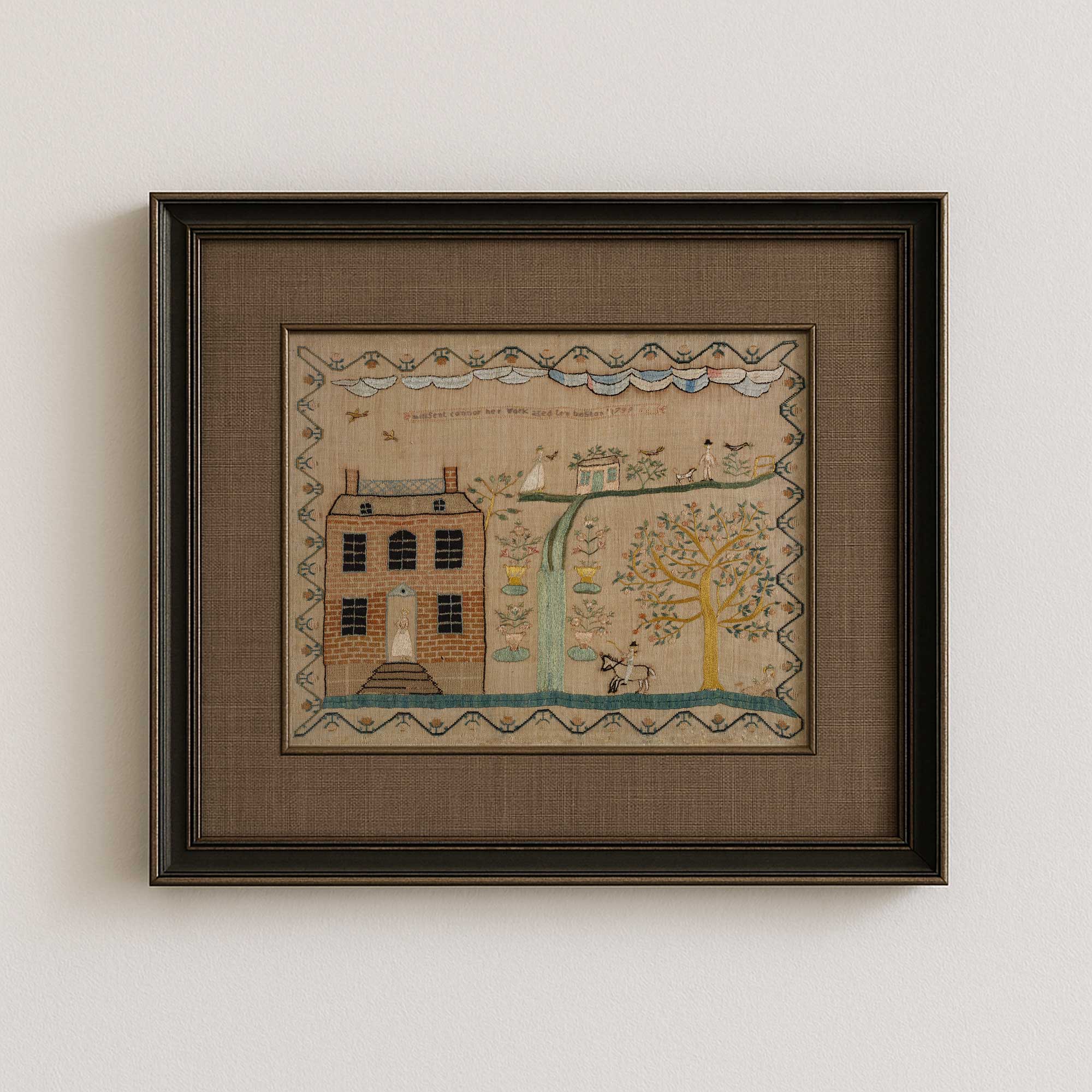 Whimsical folk art house print with brown mount in dark brown frame