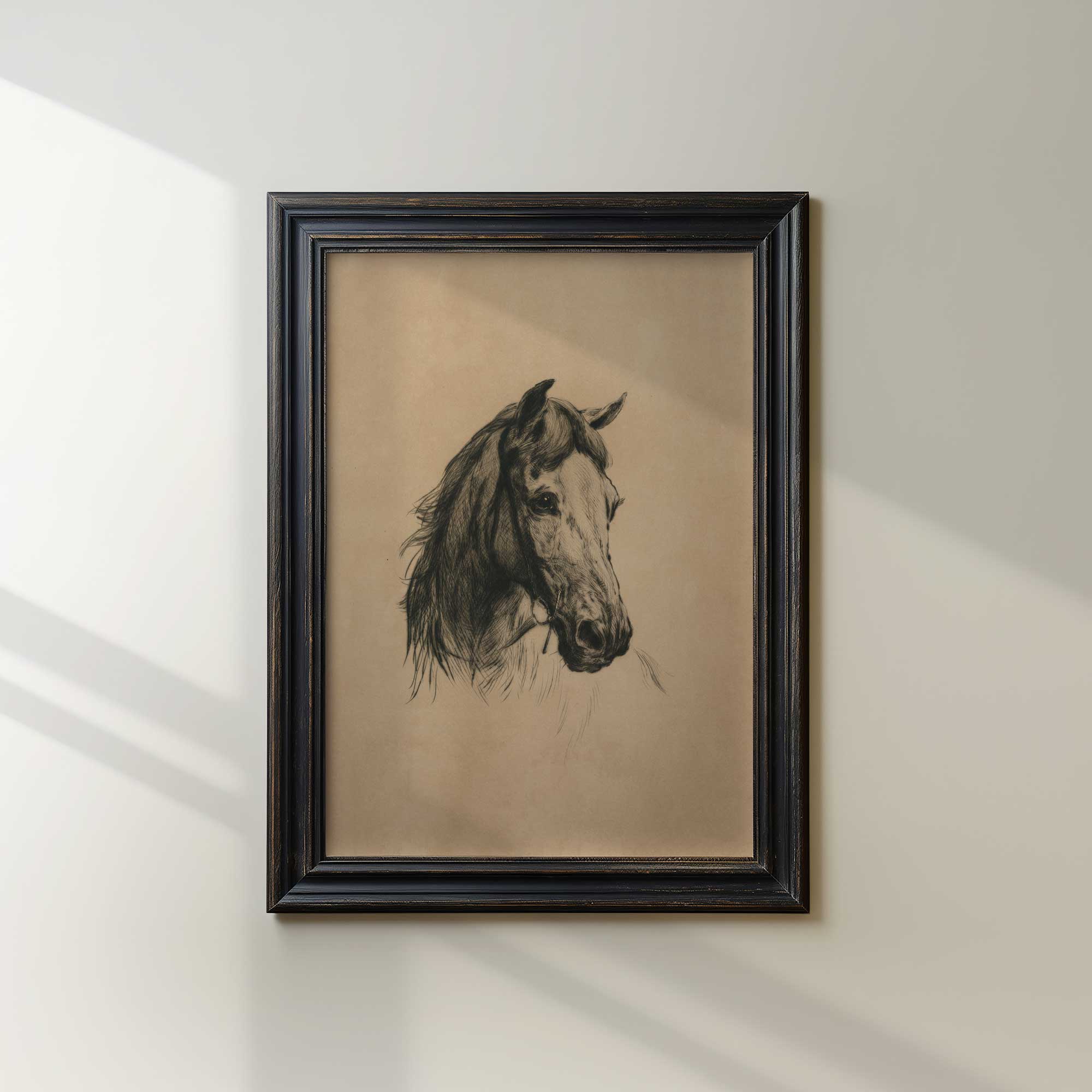 Framed artwork of a horse's head on a beige background