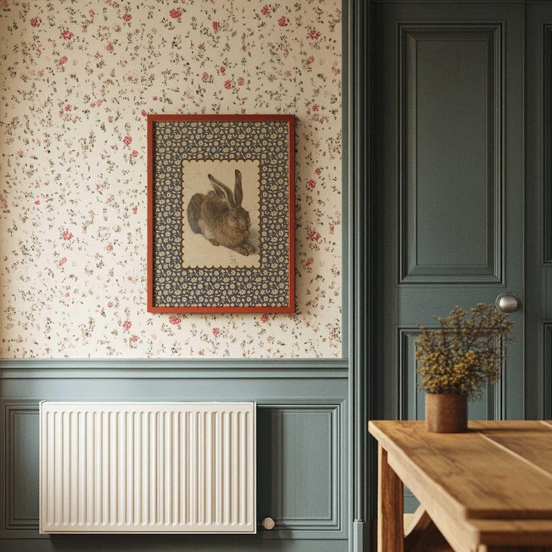 Close-up of hare illustration with scalloped edge detail on floral patterned background.