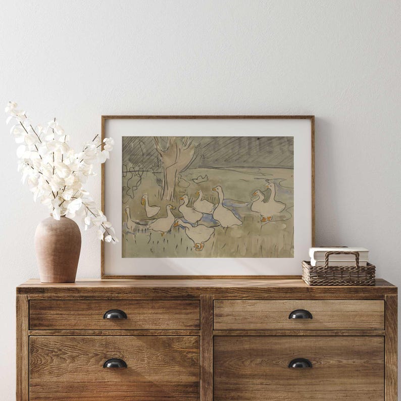 Vintage ducks wall art in farmhouse-style nursery with wooden dresser.