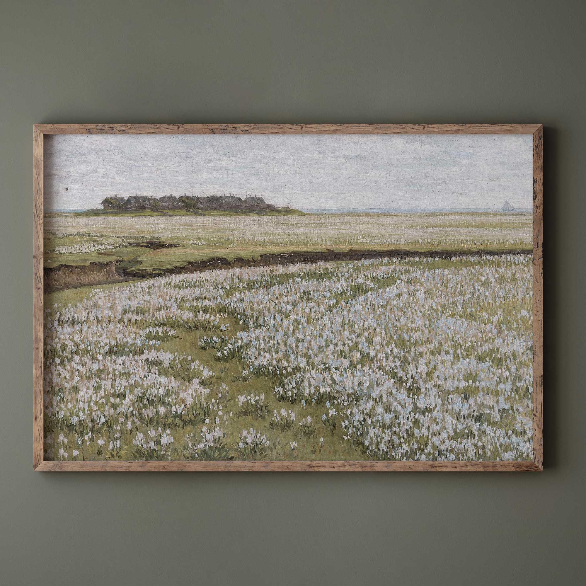 Framed artwork of a landscape with Blooming Floral Meadow on a green wall