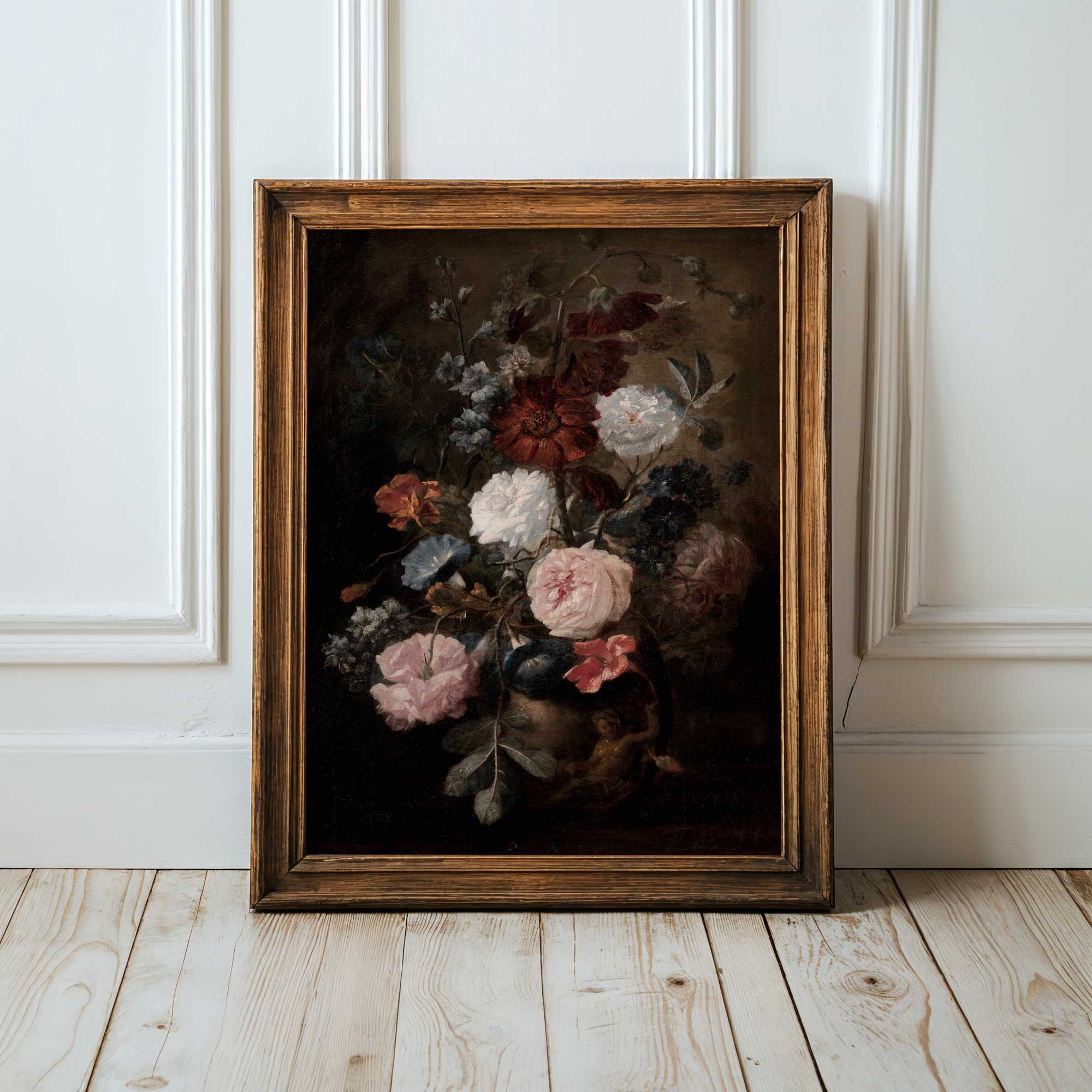 Framed floral painting on a wooden floor with white paneled walls