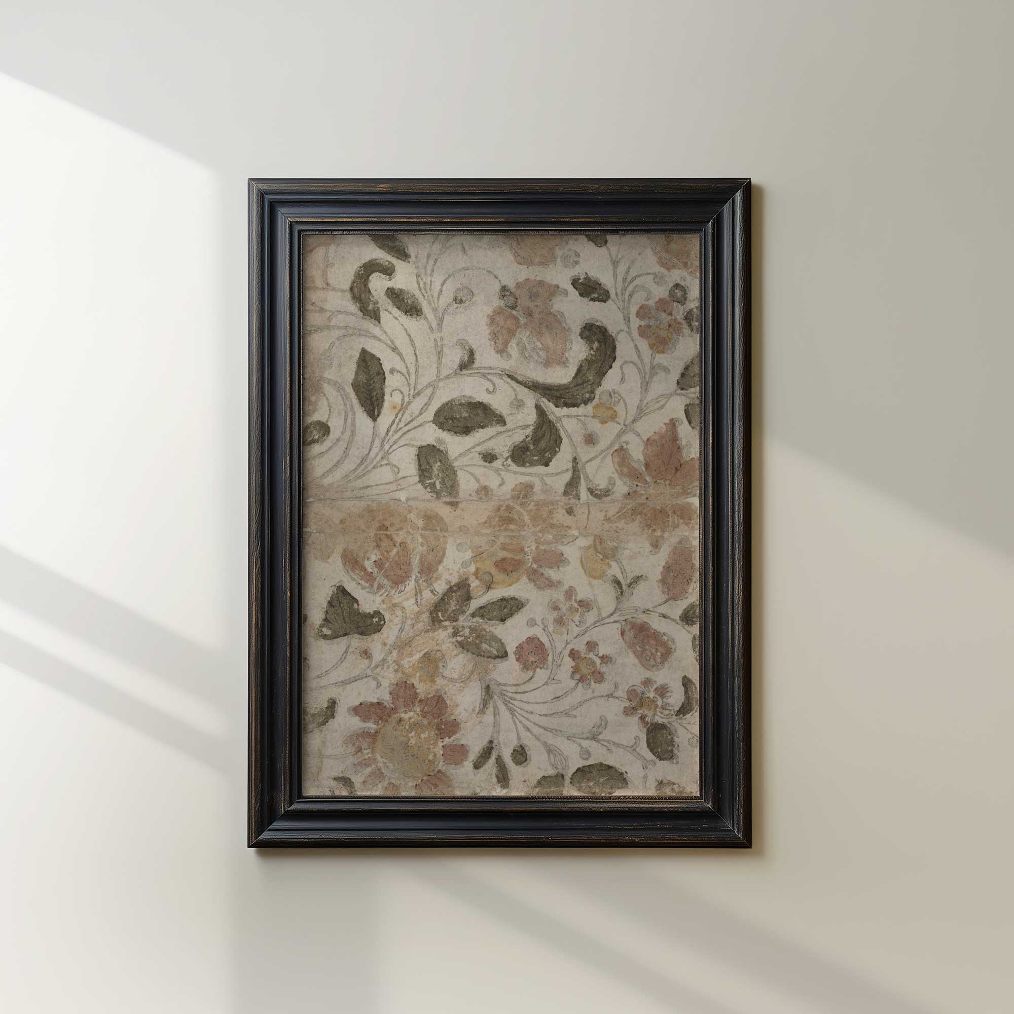 Framed floral artwork on a wall