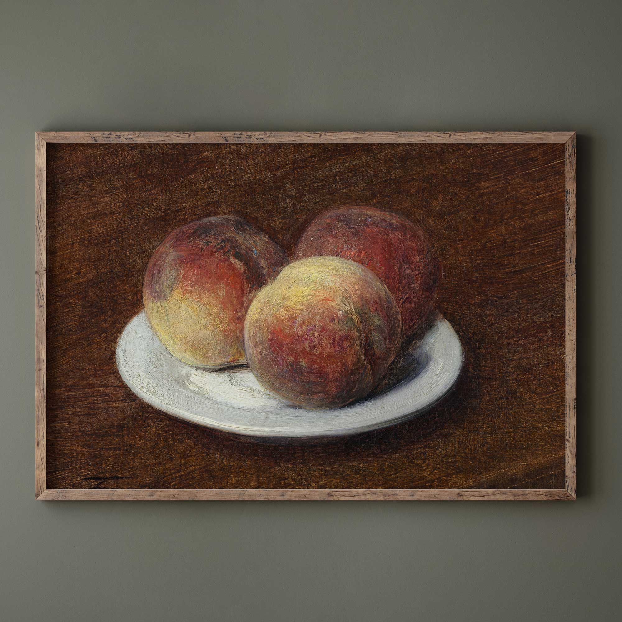 Framed artwork of peaches on a plate against a dark background