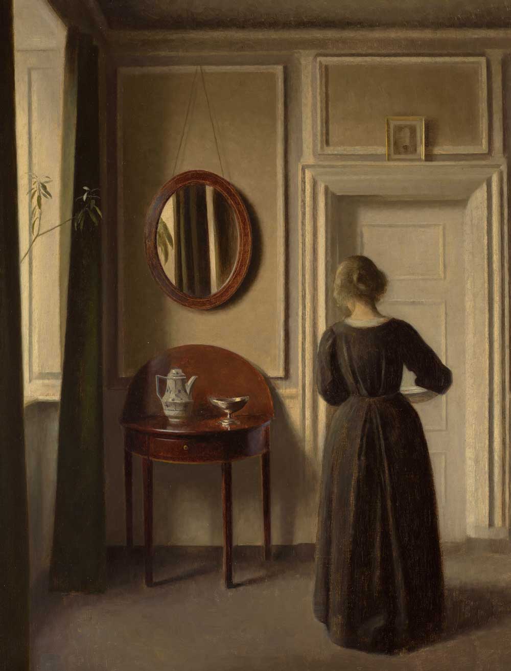 Contemplative Portrait: Woman with Tray in Vintage Interior