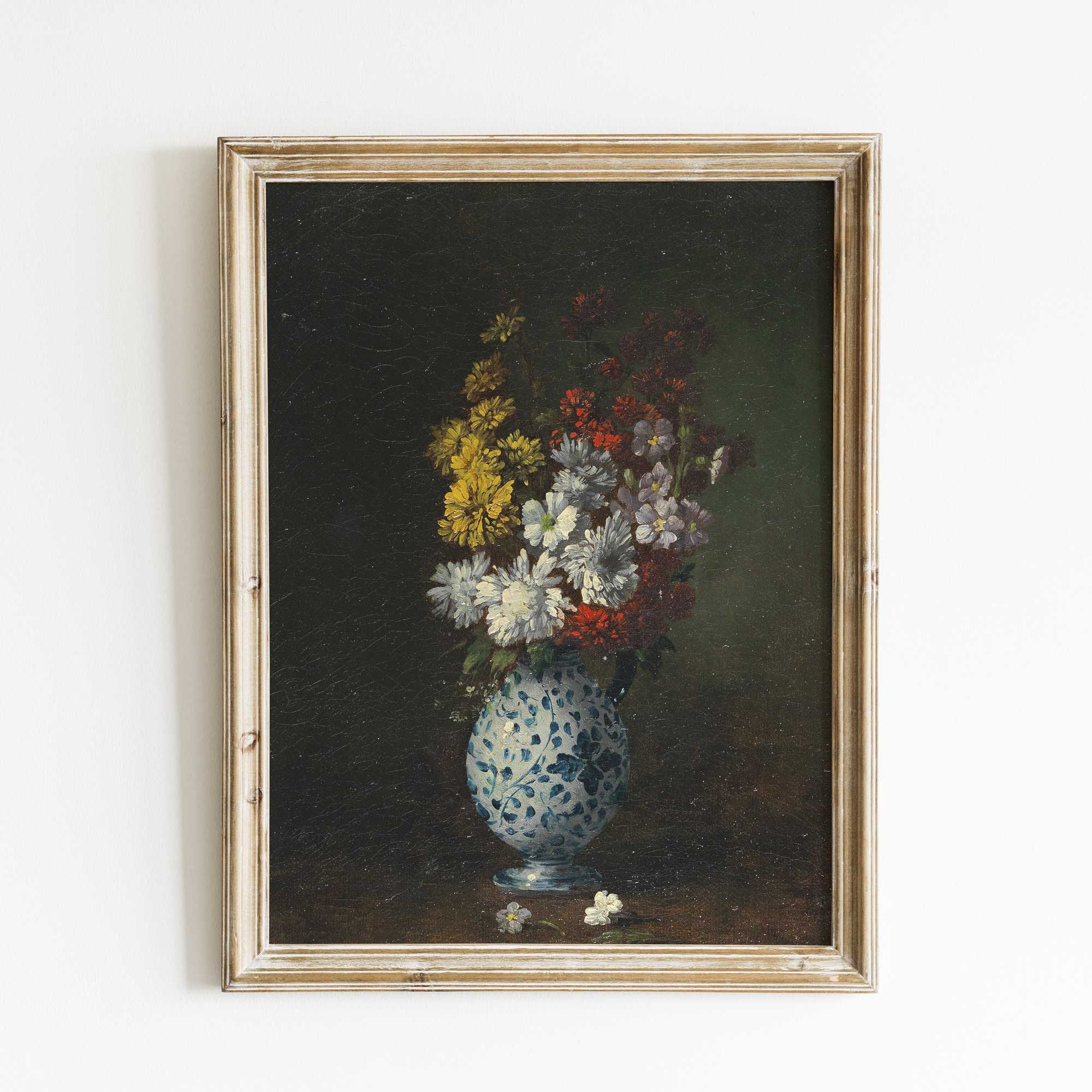 Vintage Floral Still Life Art Print featuring a gathered bouquet of wildflowers in a blue patterned vase. 