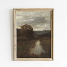 Framed Moody Vintage Landscape Print on a white wall.