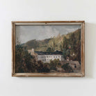 Framed painting of a Vintage Estate European Manor in Woodland with a building and trees on a white wall