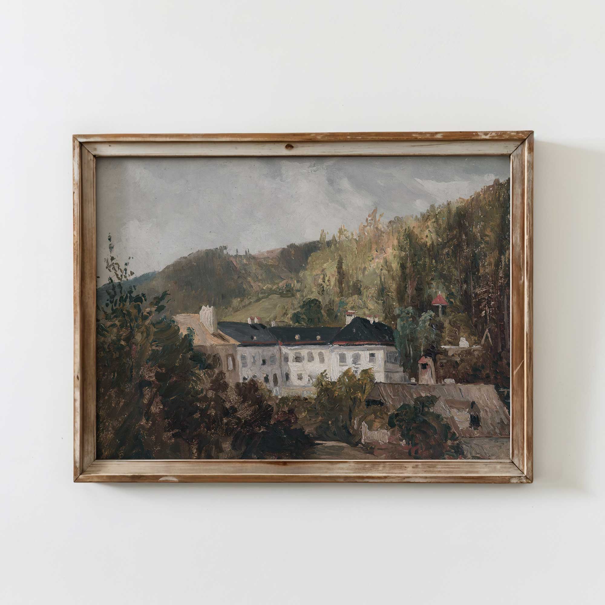 Framed painting of a Vintage Estate European Manor in Woodland with a building and trees on a white wall