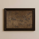 Framed artwork of the hundred horses in moody tones on a beige wall