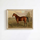 Framed painting of a brown horse in a field on a white wall