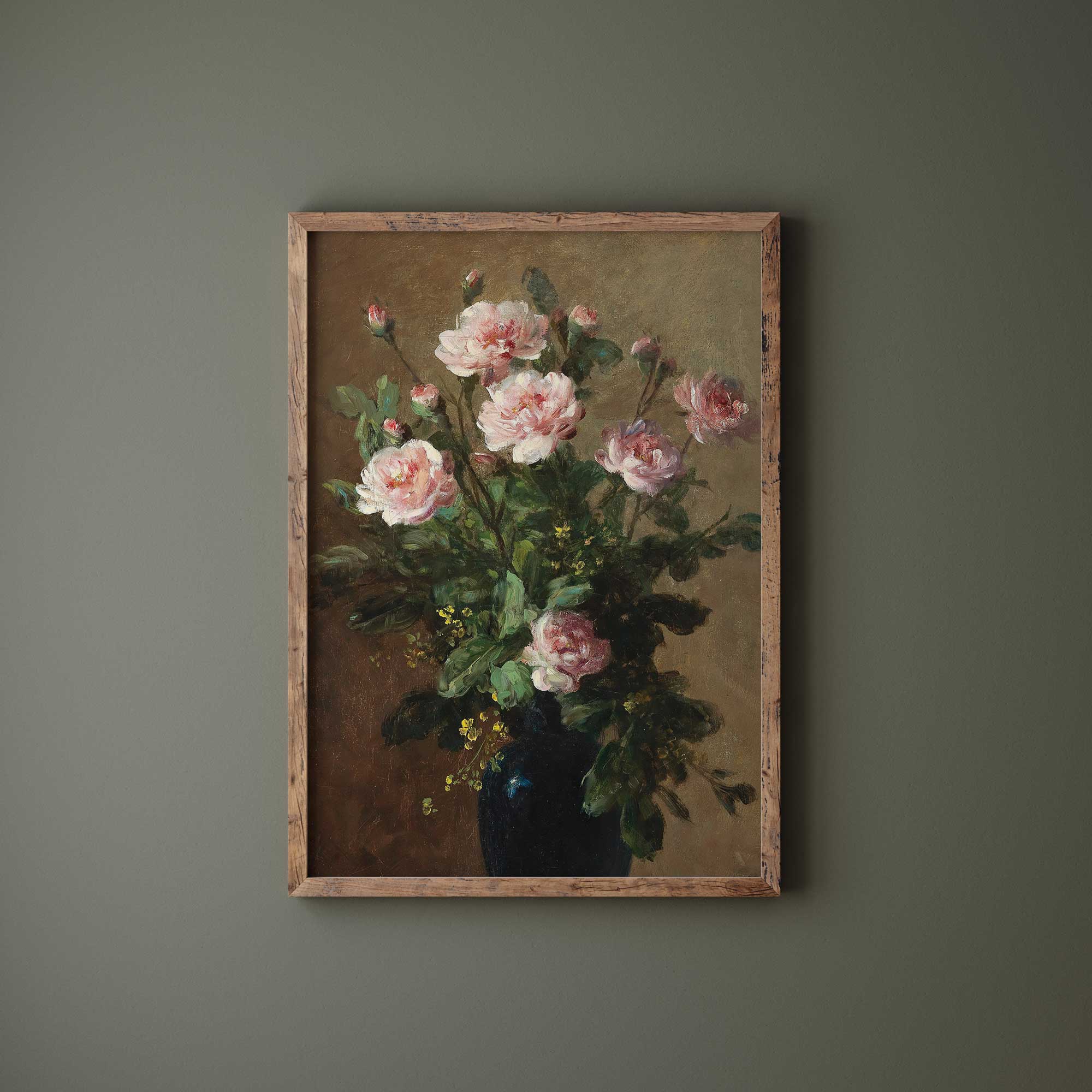 Framed painting of pink flowers on a green wall