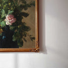 Moody Vintage Still Life Print in a gold frame on a white wall