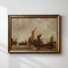 Framed painting of sailboats on a body of water against a cloudy sky.