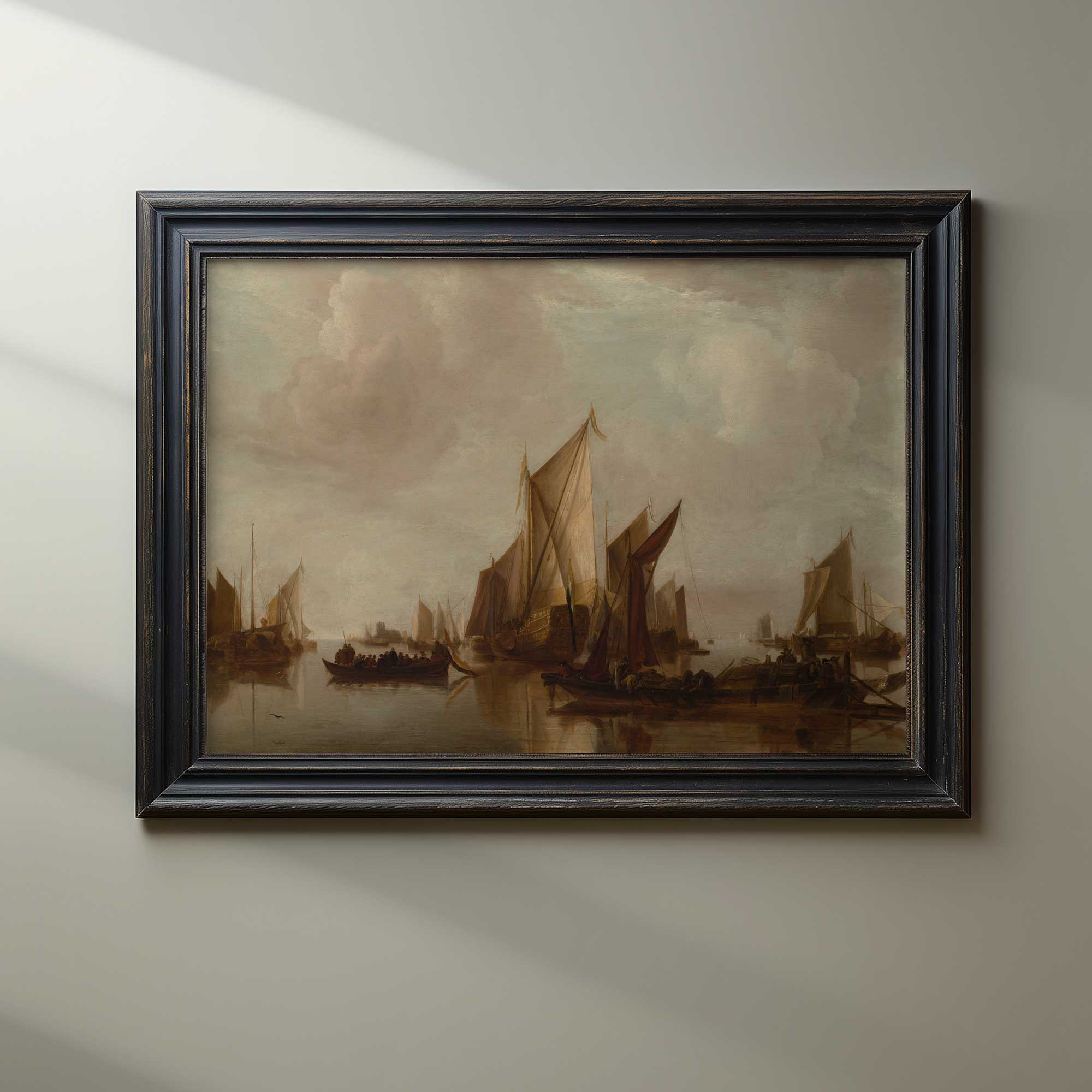Framed painting of sailboats on a body of water with a cloudy sky.