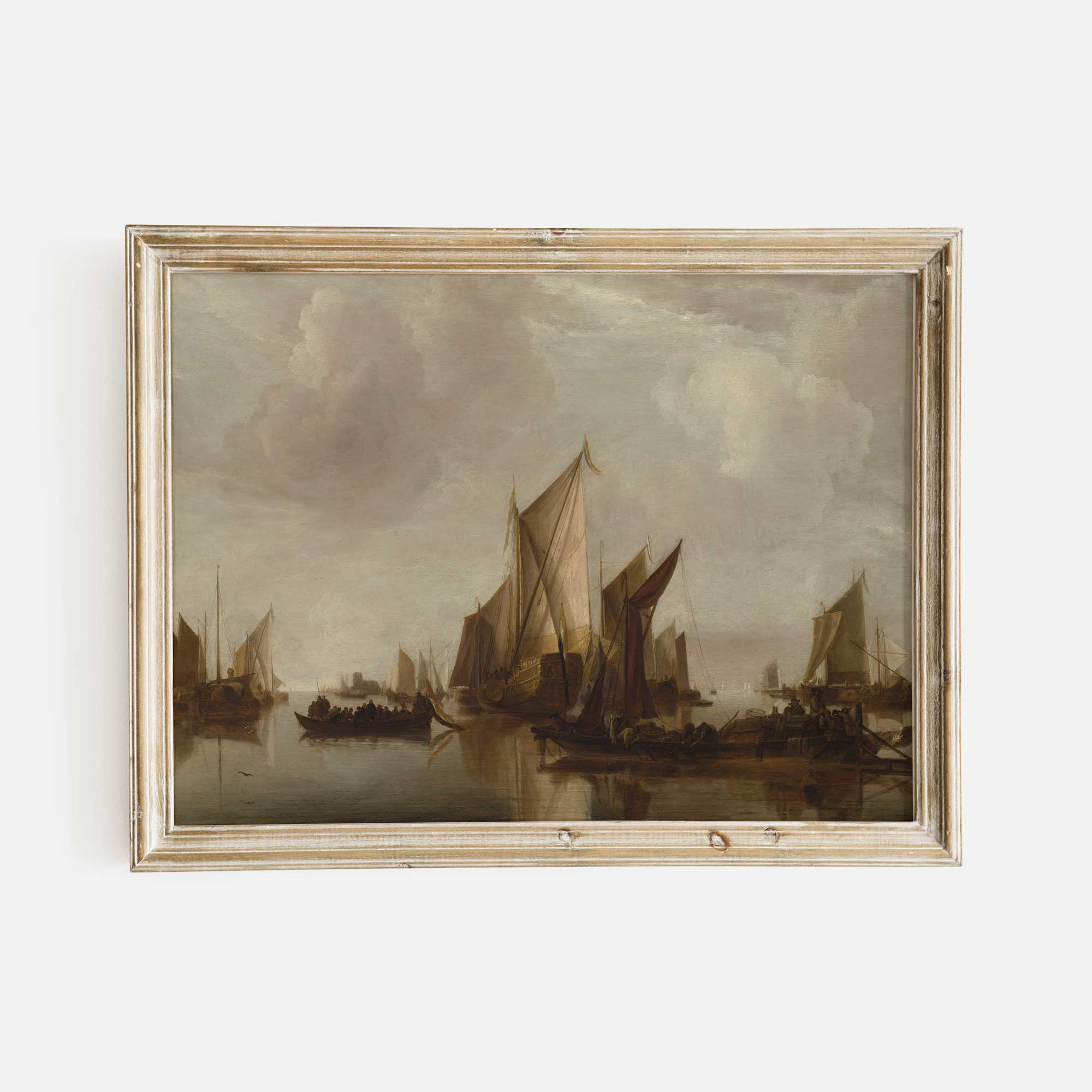 Framed painting of sailboats on a body of water with a cloudy sky.
