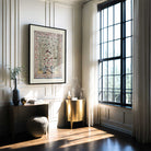 Botanical textile print with vintage bird and floral design displayed in classic living room setting.