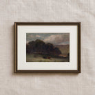 Vintage countryside wall art in matted frame featuring a moody pastoral landscape with cows and woodland trees