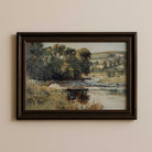 Vintage summer landscape print featuring a peaceful river scene in a dark wood frame.