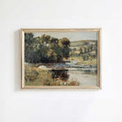 Vintage summer landscape print with a countryside river in a light wood frame.