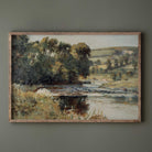 Vintage summer landscape print in a rustic wood frame featuring a peaceful countryside river scene.