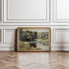 Vintage summer landscape print in an ornate gold frame with rustic country charm.