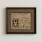 Whimsical folk art house print with brown mount in  dark brown frame 