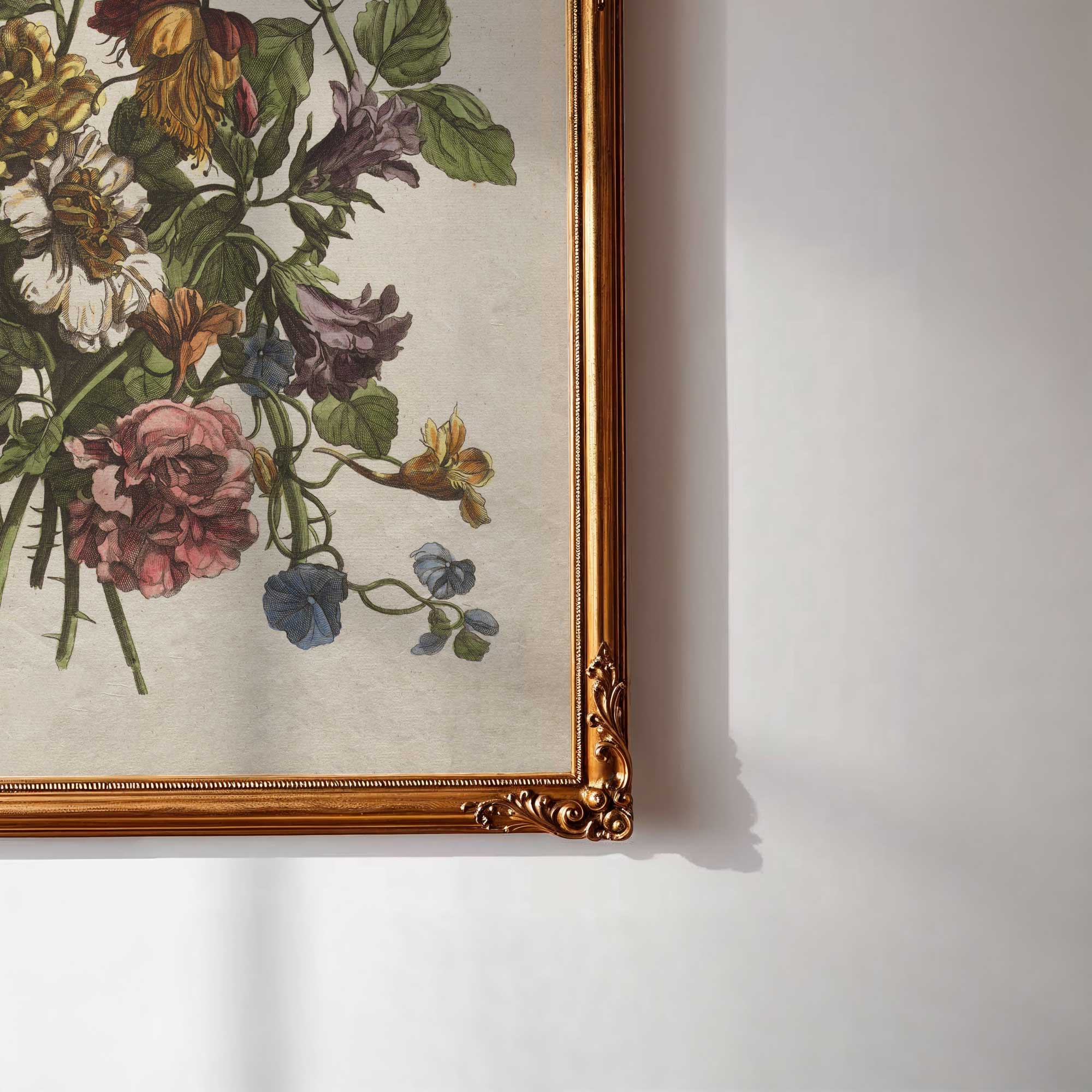 Framed floral artwork on a white wall
