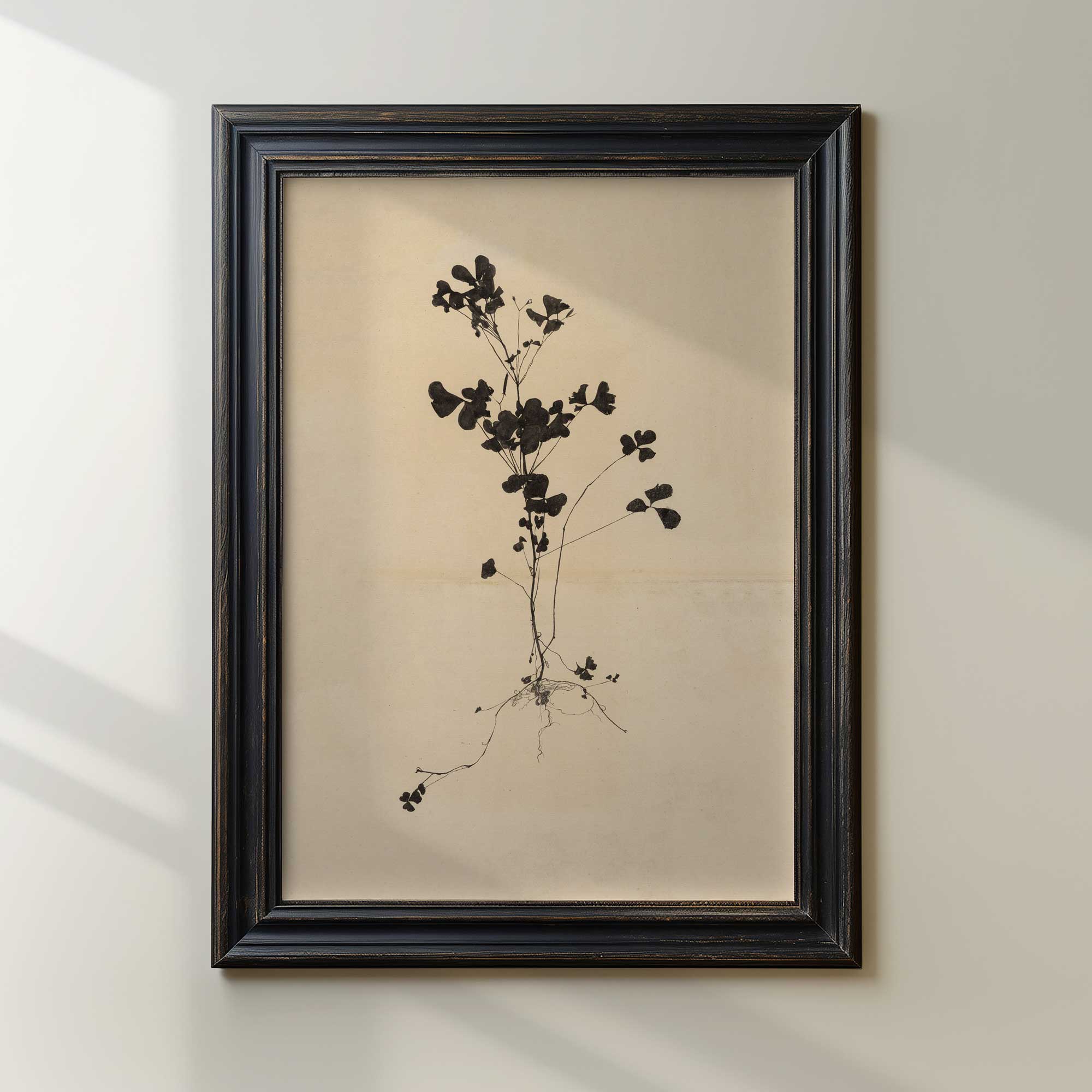 Framed Dark botanical illustration print on a beige background