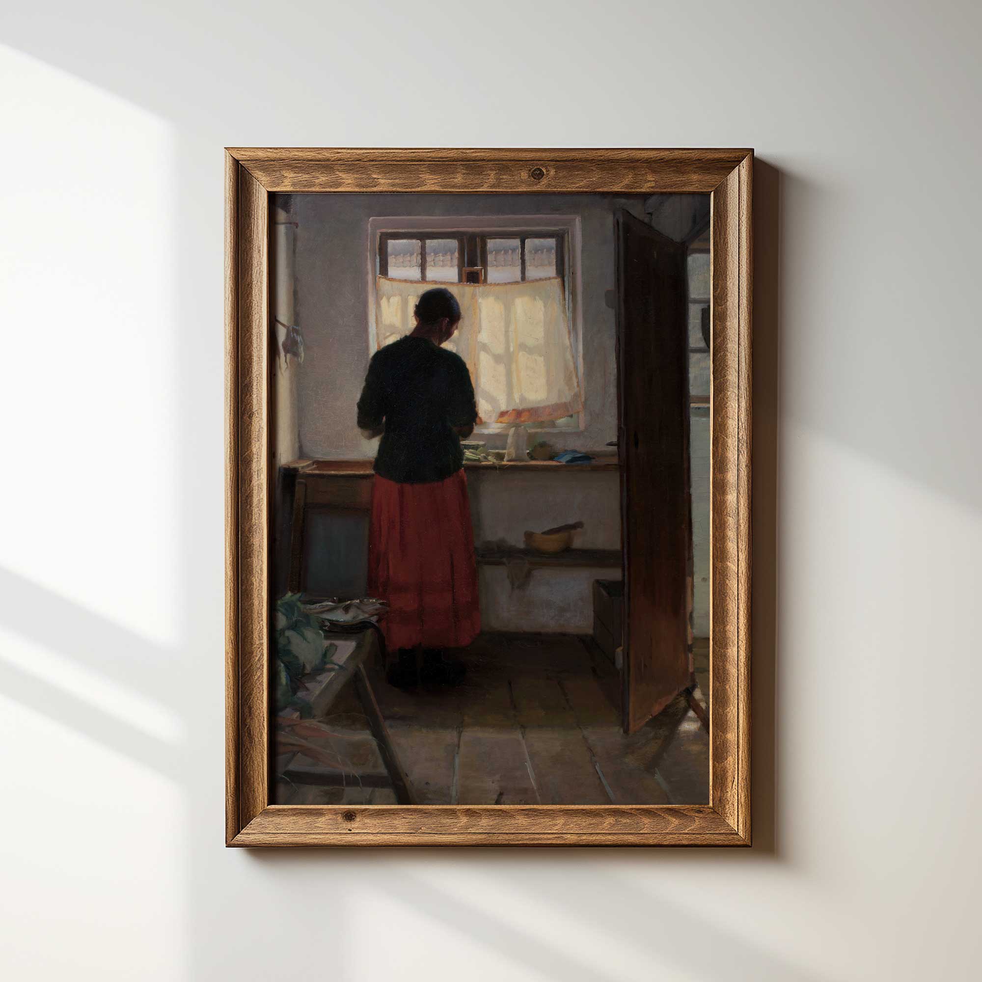 Maid in the kitchen print featuring a woman standing at a farmhouse window in an antique country home